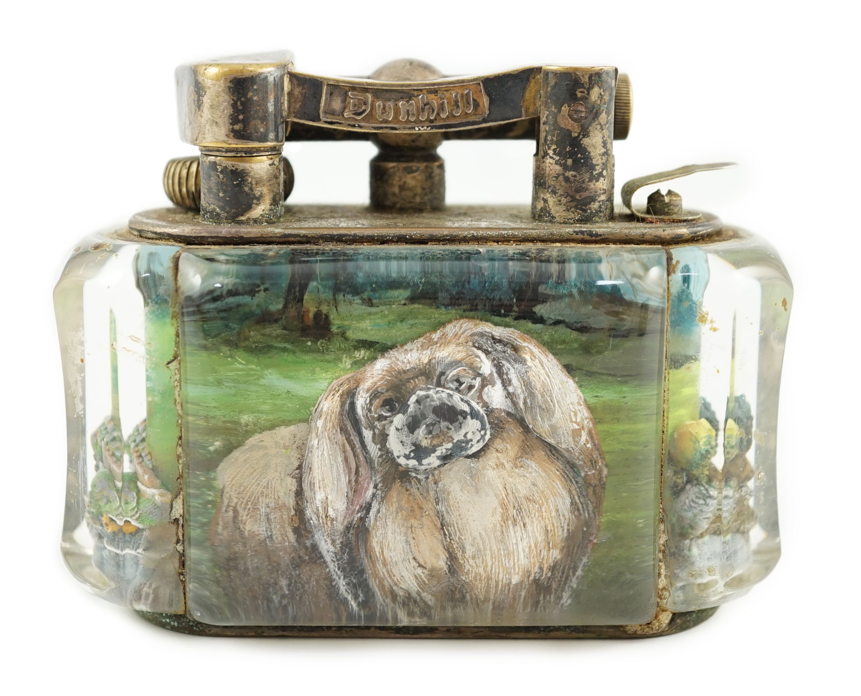 A rare Dunhill lucite cigarette lighter with unusual decoration of a Pekingese dog, width 10cm depth 5cm height 7.5cm